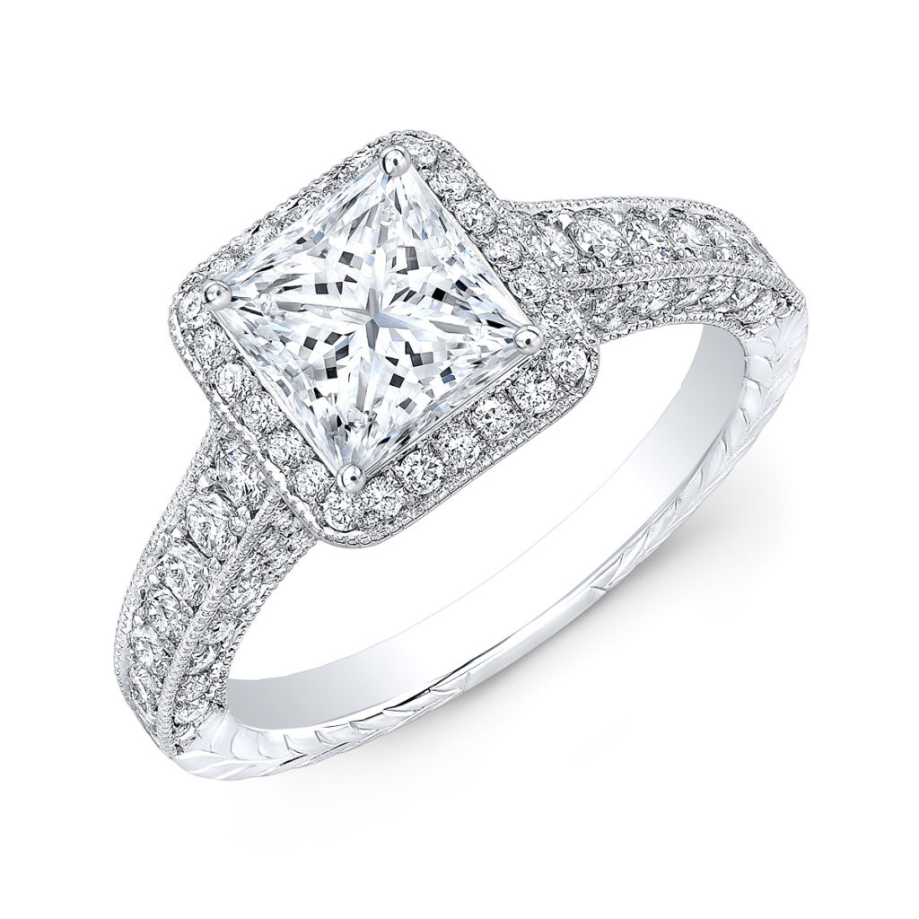 Princess cut halo engagement ring with hand engraving on the shank