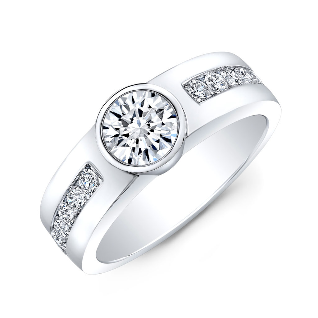 This diamond ring is channel set and Bezel set holding the center stone. The gap allows light to radiate from the stone. 