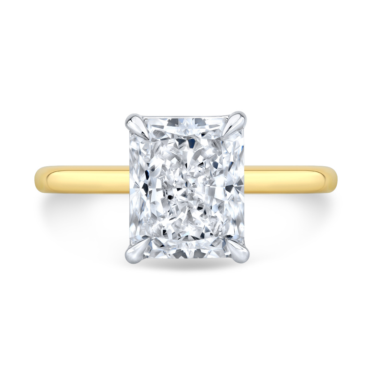 2.50 Carat Radiant cut on a Yellow Gold Band.