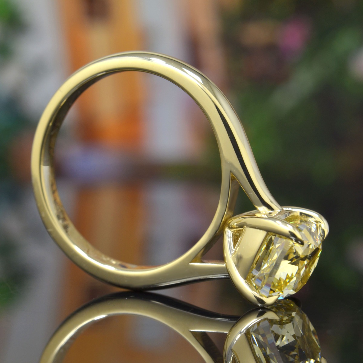 Fancy Light Yellow Diamond on a yellow gold engagement ring