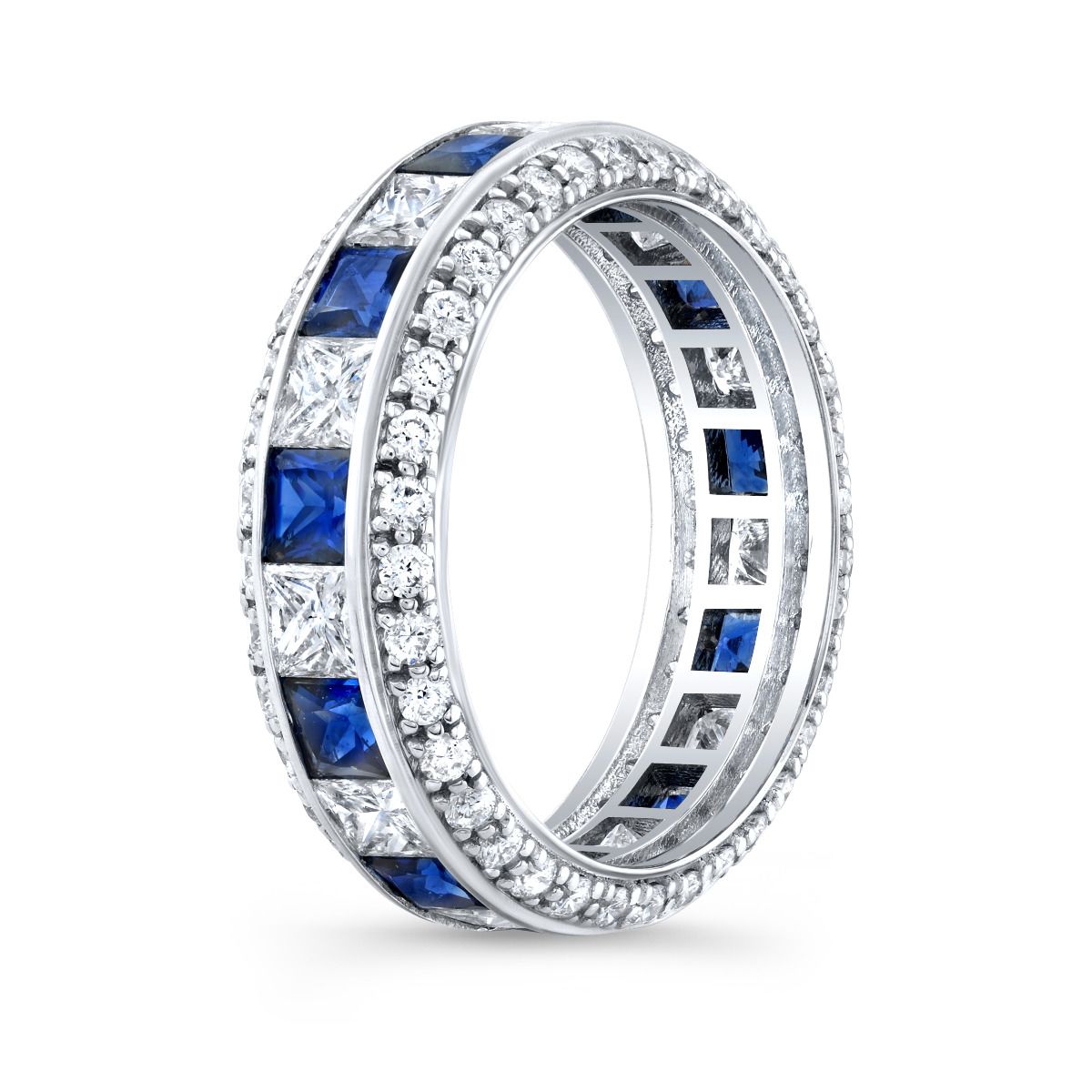 Elegant and gleaming Princess cut Diamonds and Blue Sapphire that goes all the way around is beautifully set on this Channel set design