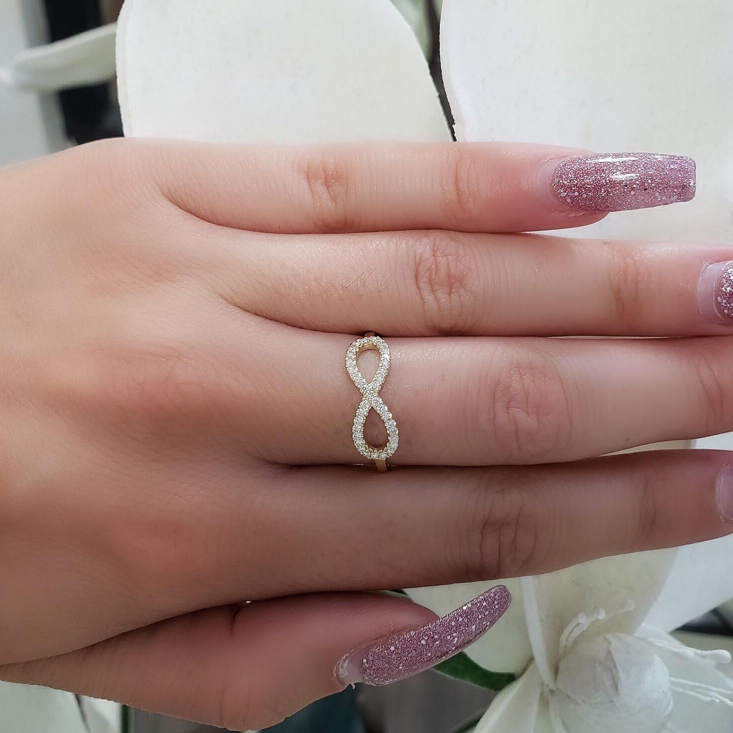 Infinity | 18K Rose Gold halo style engagement ring | Taylor & Hart