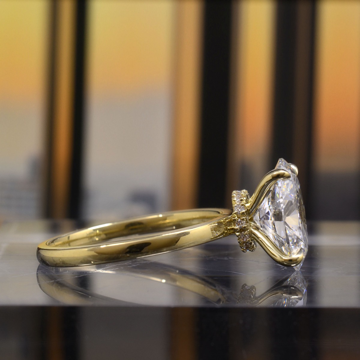 Hidden Halo Solitaire Diamond Engagement Ring seen from a side profile